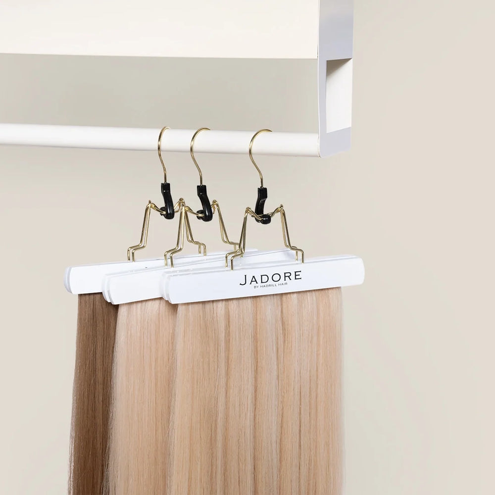 Jadore wall display rack with hangers; hair extensions not included