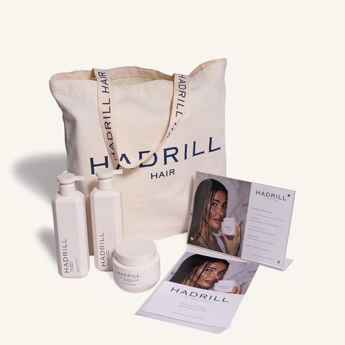 Hadrill Retail Ready Opening Parcel with unboxed shampoo, conditioner, treatment mask, branded tote bag and salon merchandising materials