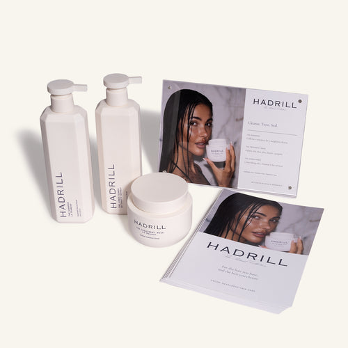 Hadrill Signature Ritual Opening Parcel with unboxed shampoo, conditioner, treatment mask and salon merchandising materials